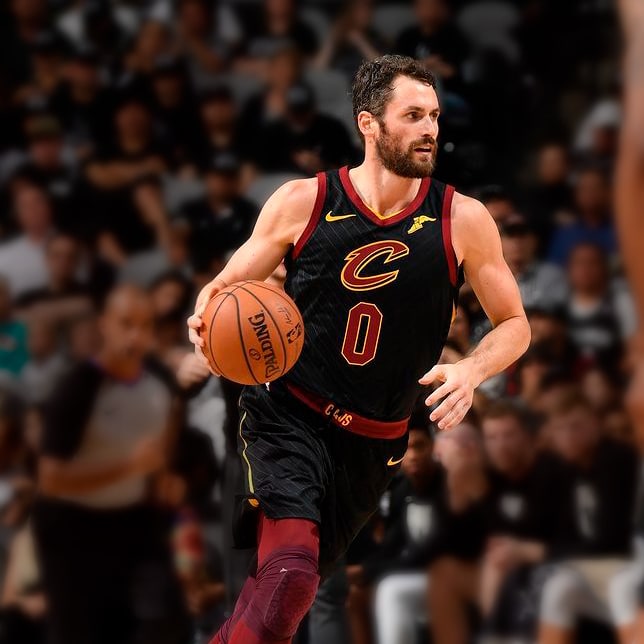 Kevin Love playing basketball during game